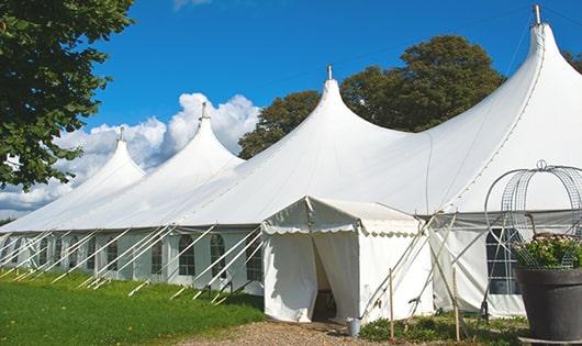 a line of sleek and modern portable toilets ready for use at an upscale corporate event in Ringwood